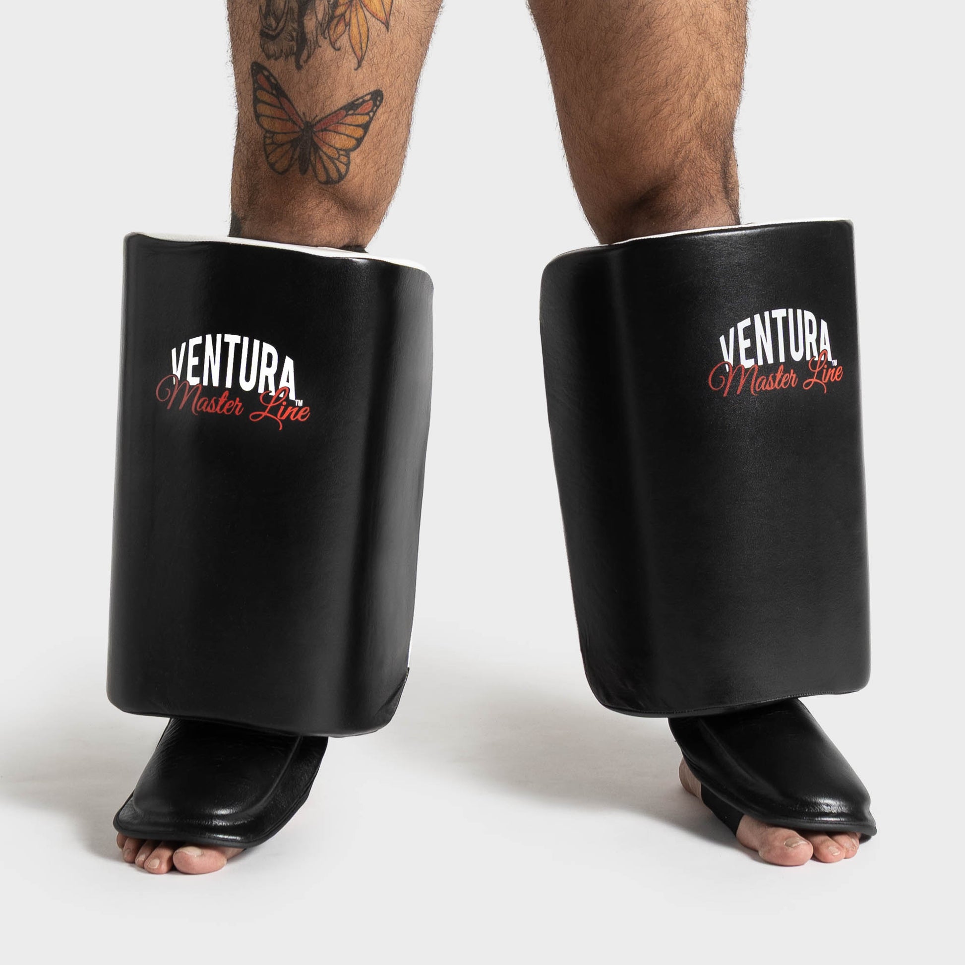 Protezione calf kick in vera pelle per Muay Thai, kick boxing e MMA