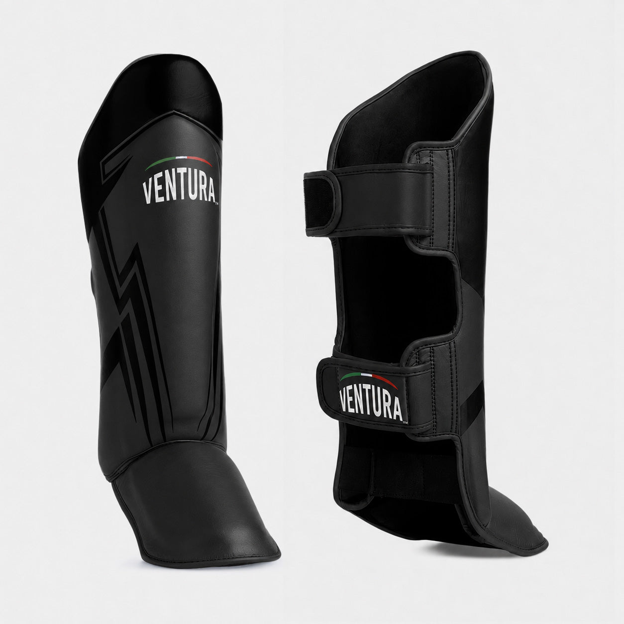 Paratibia in vera pelle da Muay Thai, kick boxing e MMA - arrow, nero opaco/nero lucido